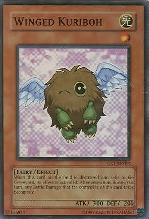 Winged Kuriboh (Winking) - GX1-EN002 - Super Rare available at 401 Games Canada